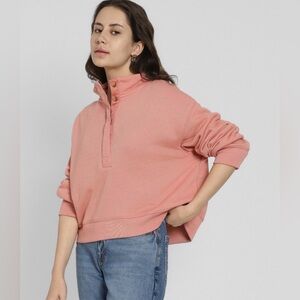 American Eagle Women's Cropped Henley Fleece Sweatshirt in a pinkish-peach XL